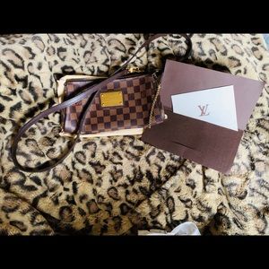Louis Vuitton wristlet/crossbody.